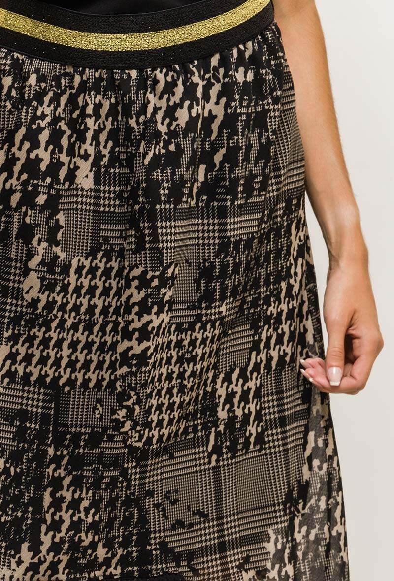 Tryckt kjol med asymmetrisk nederkant i Stor Storlek