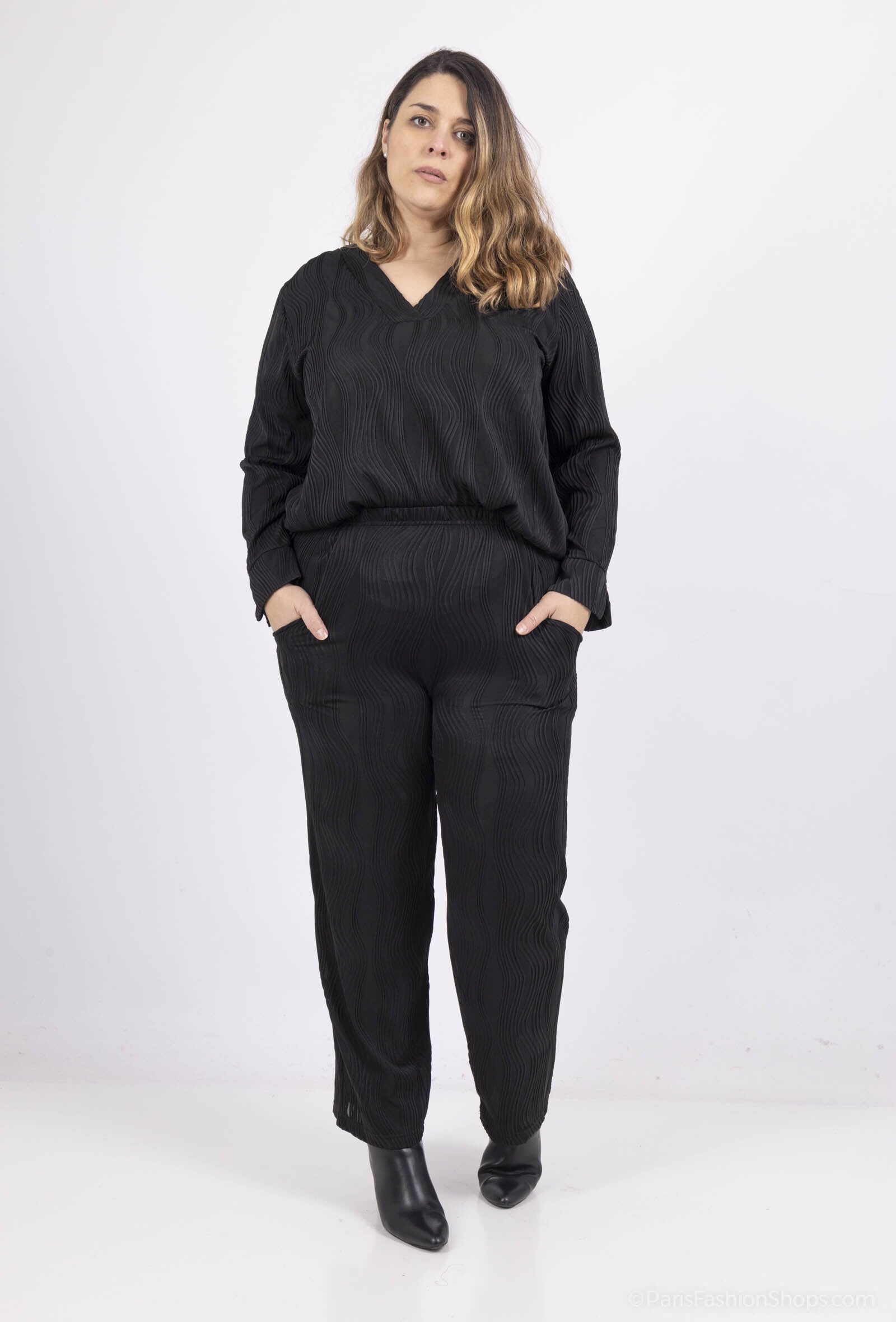 Avslappnade byxor med elastisk midja i plusstorlek