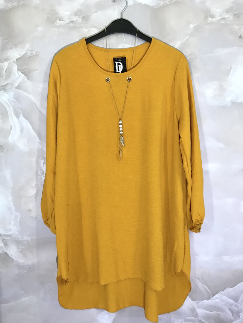 Långärmad klänning med halsband i Stor Storlek