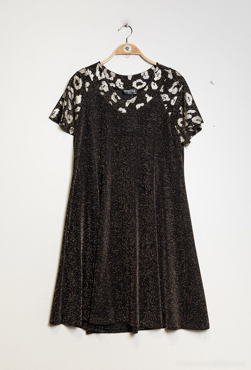 Sparkly dress with leopard print i Stor Storlek
