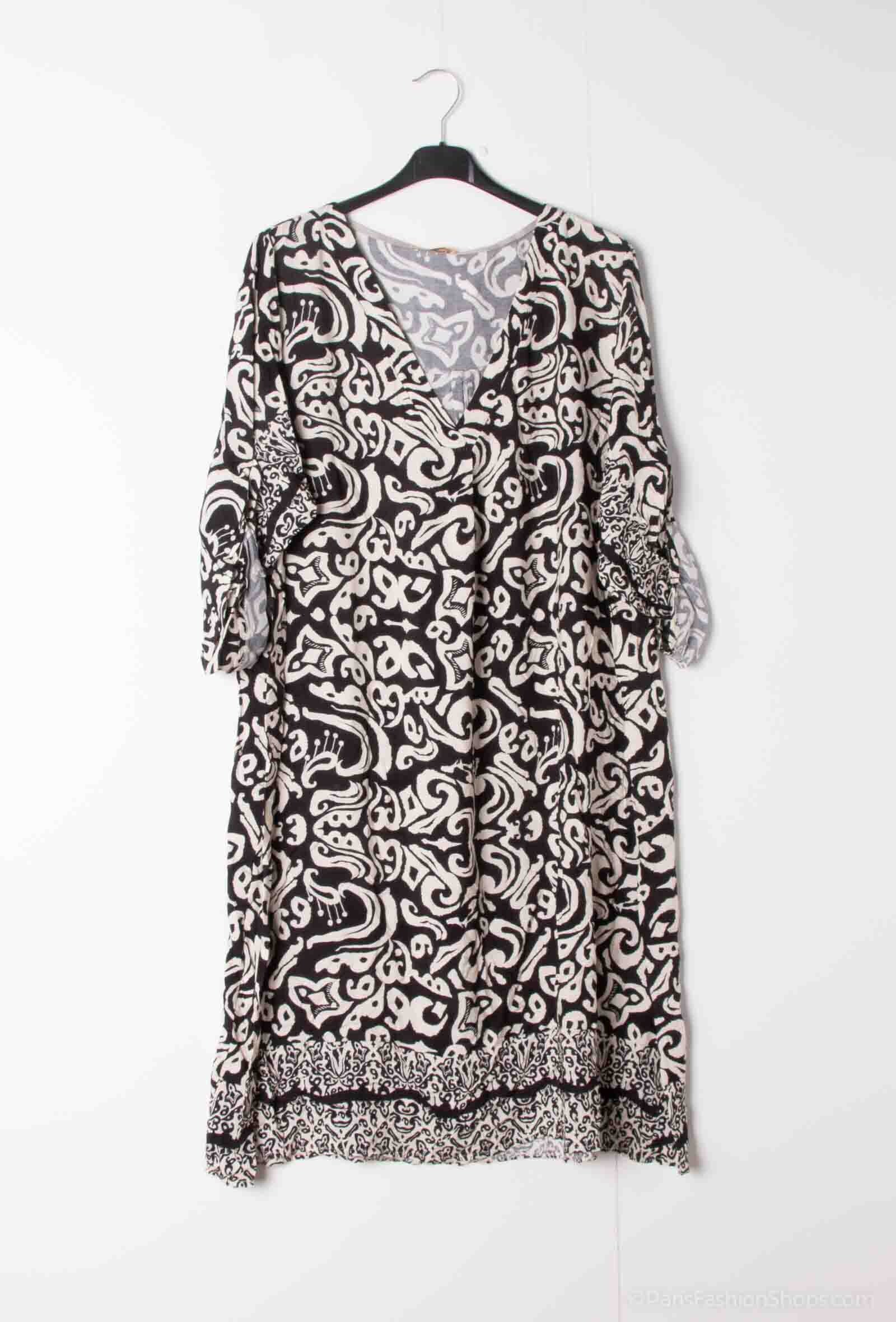 Klänning i Stor Storlek