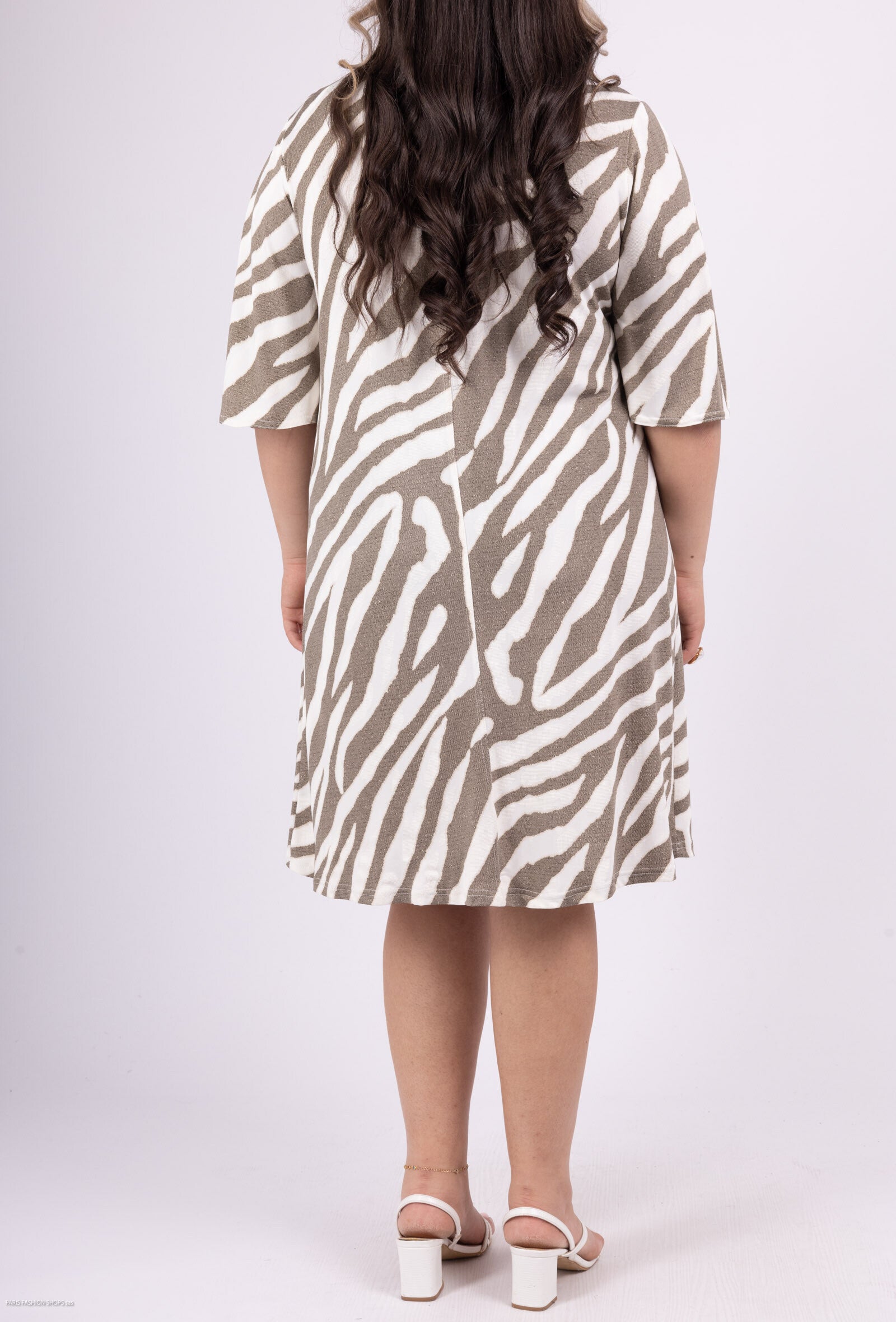 V-ringad tryckt klänning med fluid knut i Plus Size