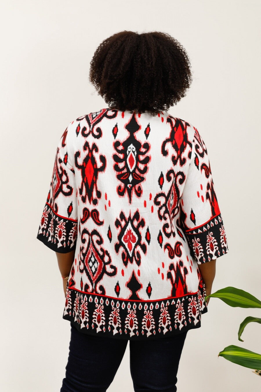 3/4 flared sleeve knot tunic i Stor Storlek