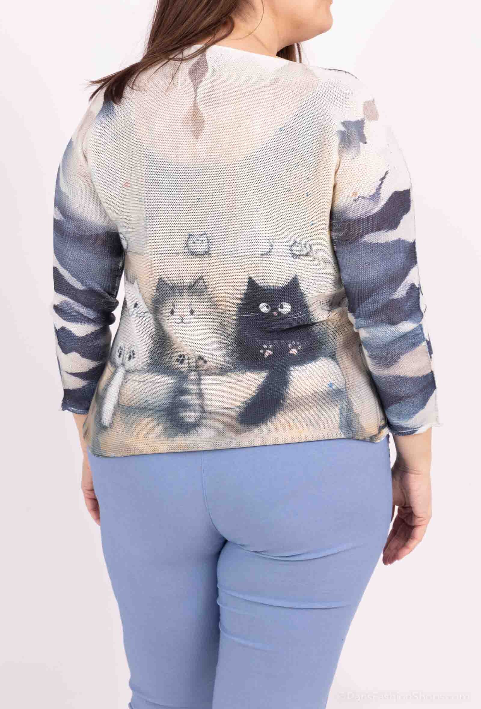 Stickad tunika med färgglada tryck i plus size