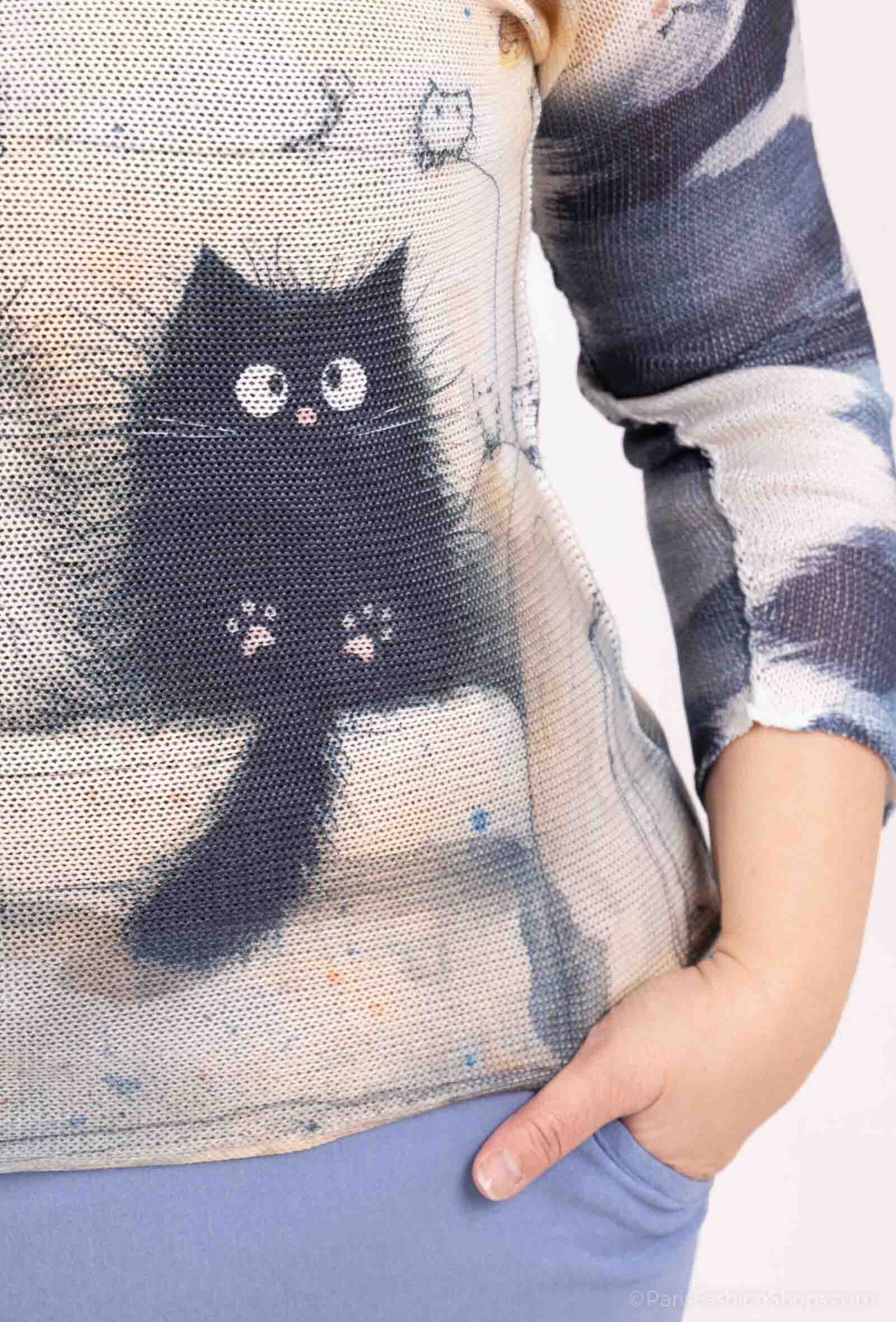 Stickad tunika med färgglada tryck i plus size