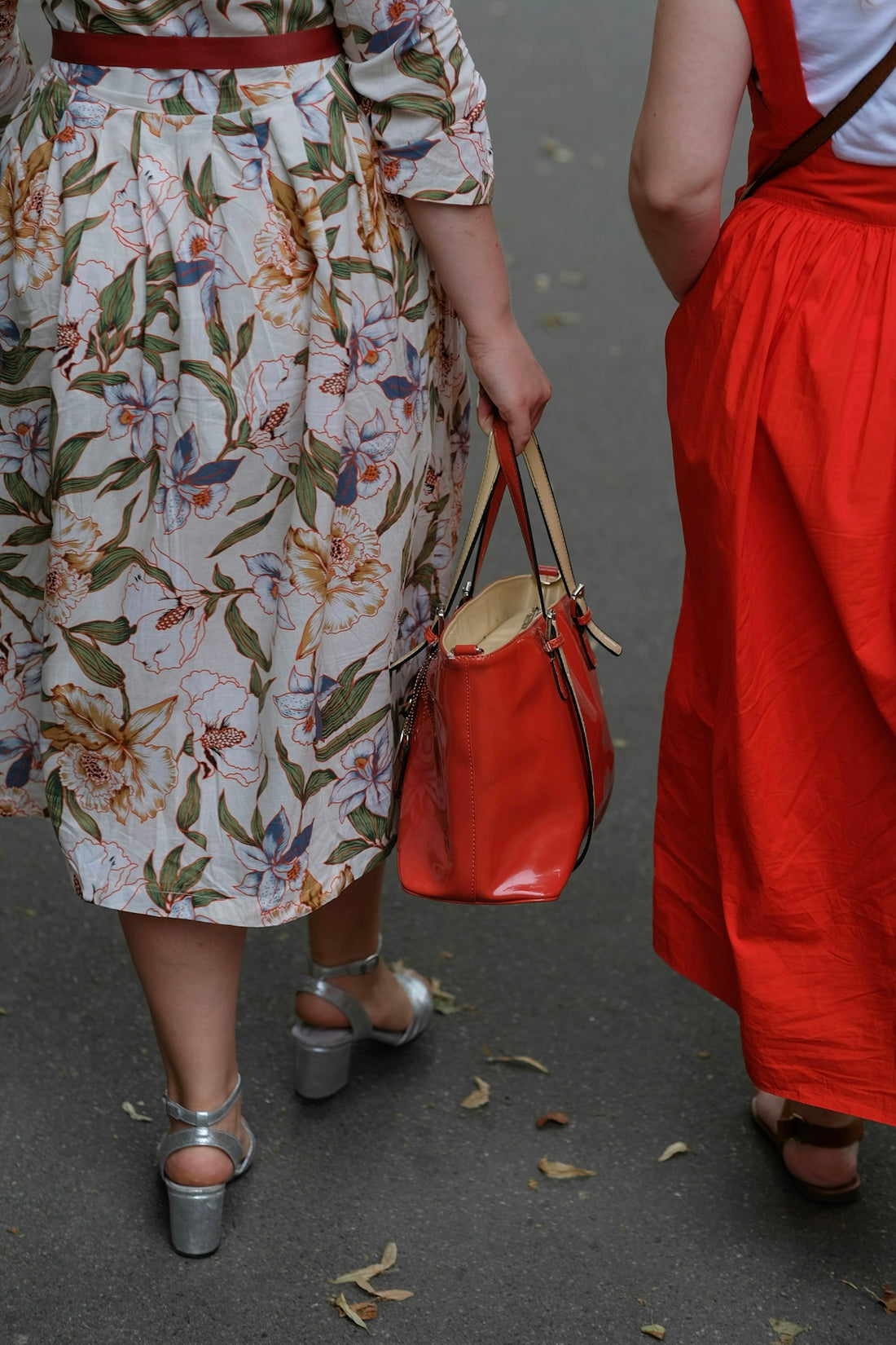 two women's red and white dresses