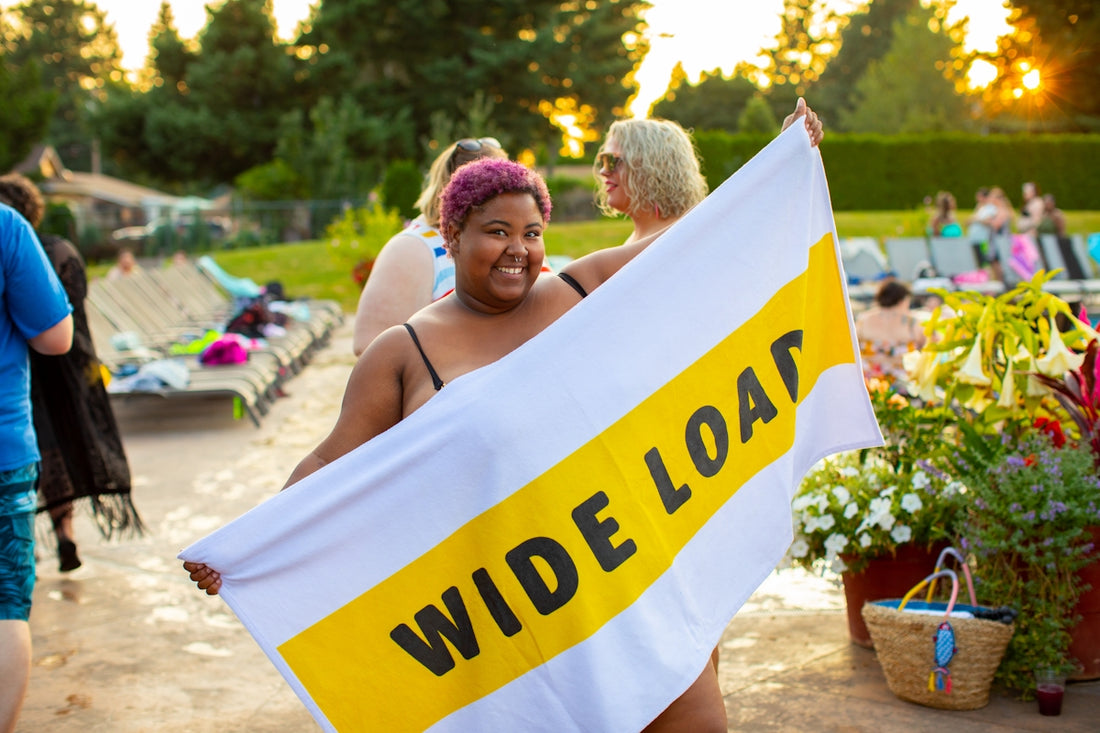 person holding white towel