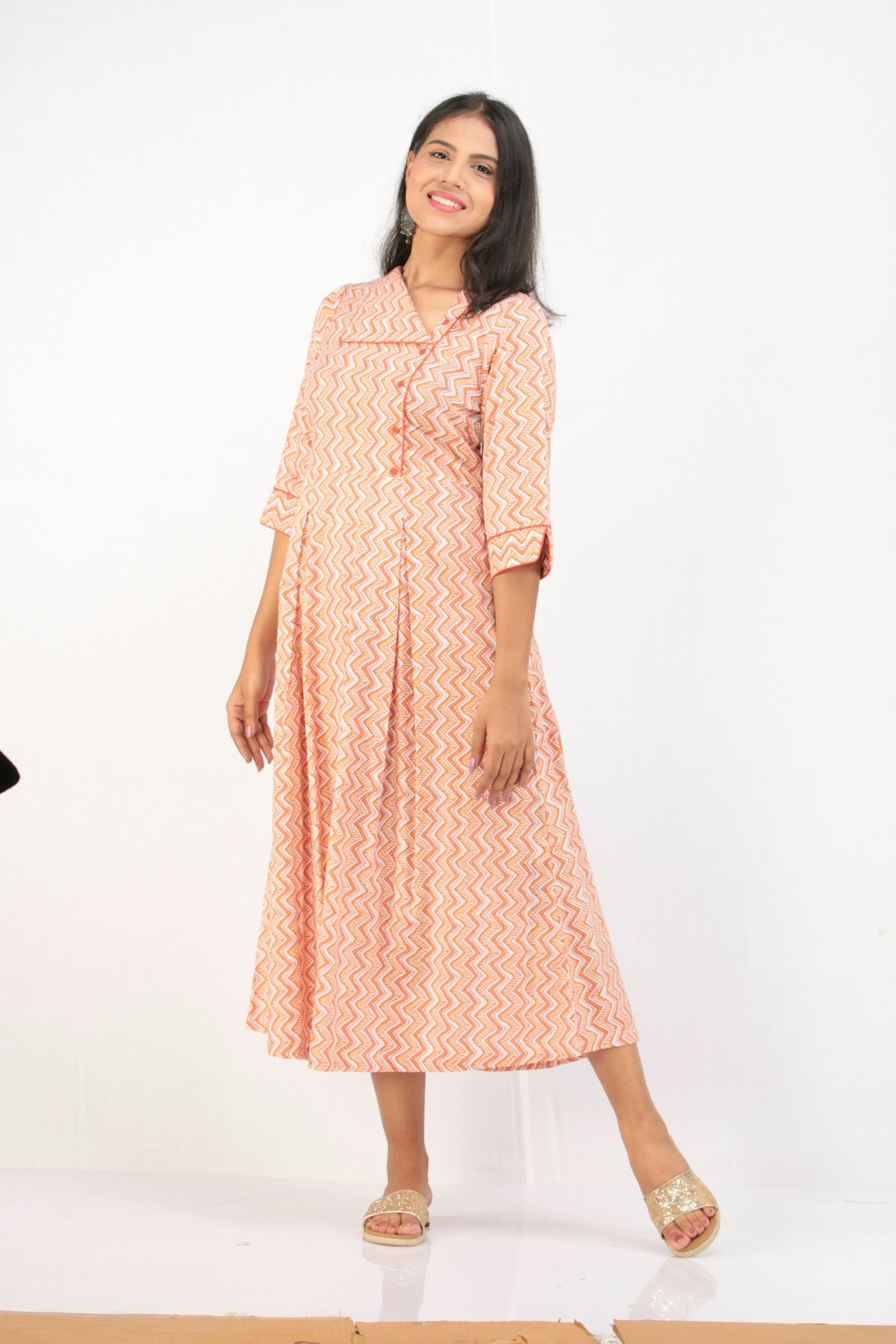 woman in pink and white dress