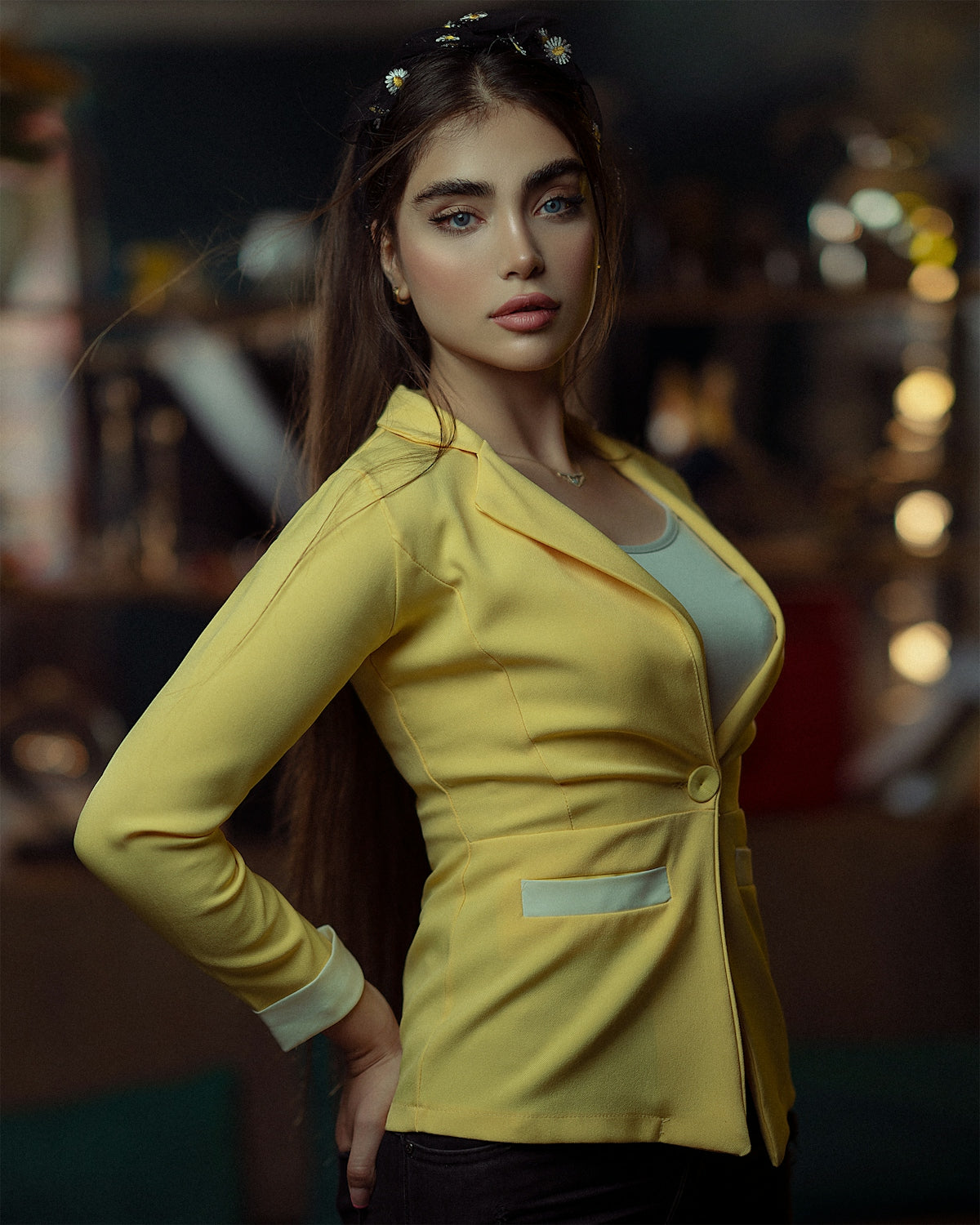 a woman in a yellow jacket