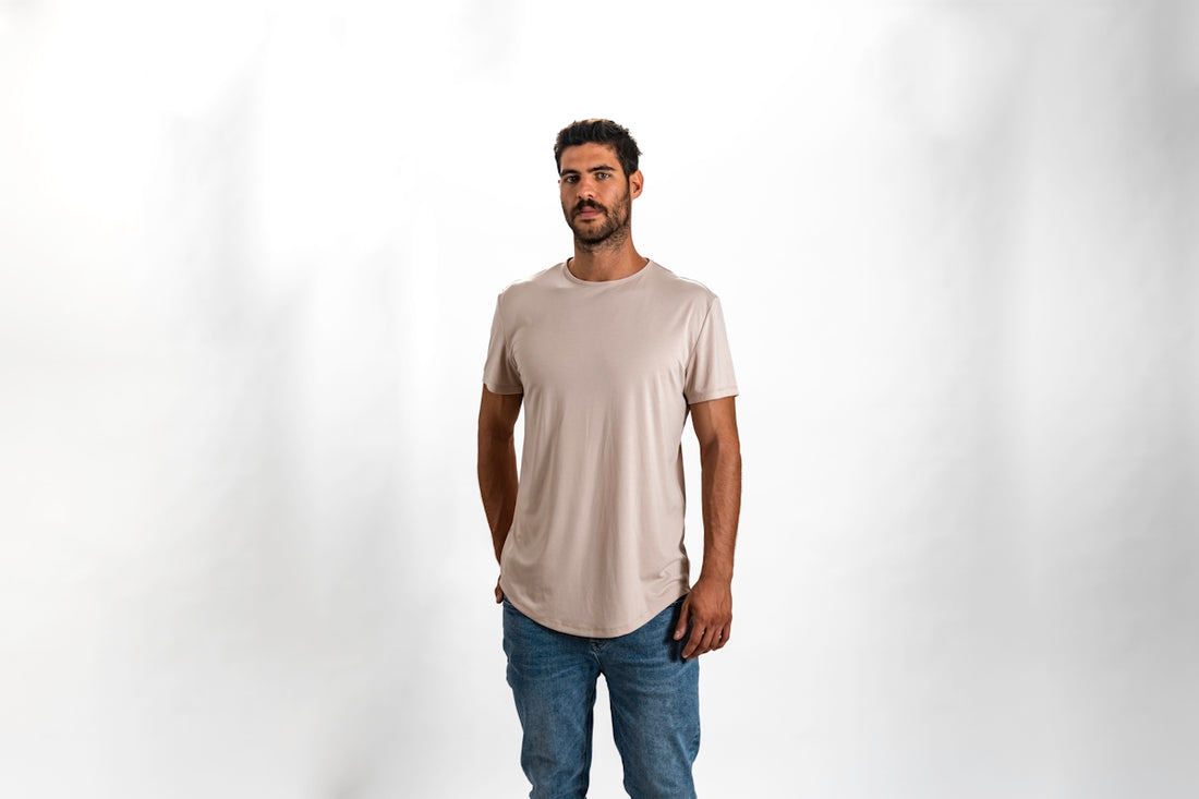 a man standing in a white shirt