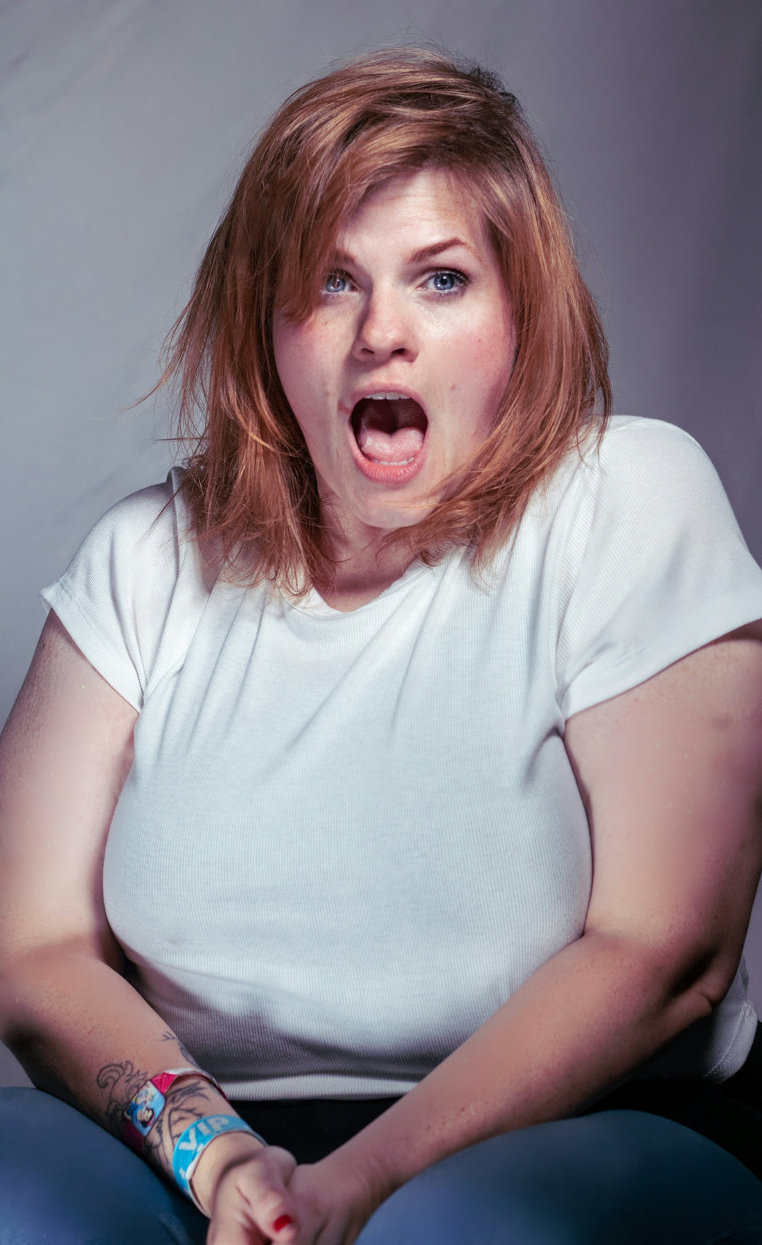 A woman with a surprised look on her face