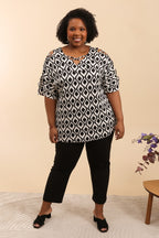 Printed blouse with openwork sleeves i Stor Storlek