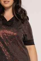 Glittrig blus i plusstorlek med yoke