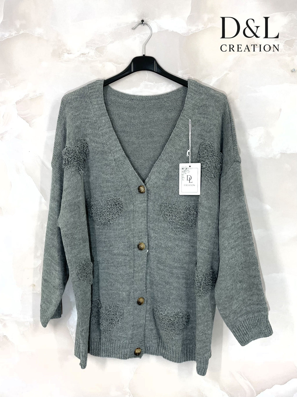 Buttoned cardigan with hearts sizes 38 to 52 i Stora Storlekar