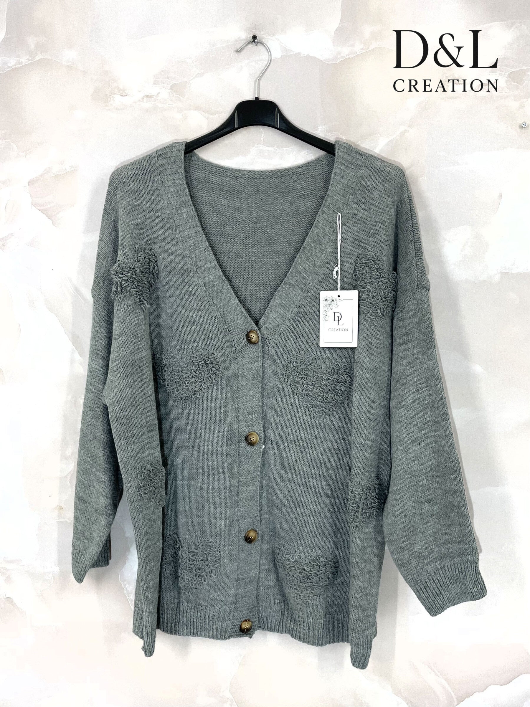 Buttoned cardigan with hearts sizes 38 to 52 i Stora Storlekar