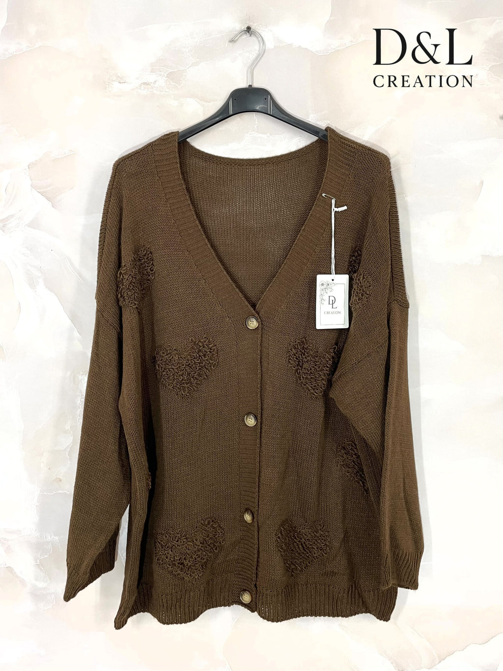 Buttoned cardigan with hearts sizes 38 to 52 i Stora Storlekar
