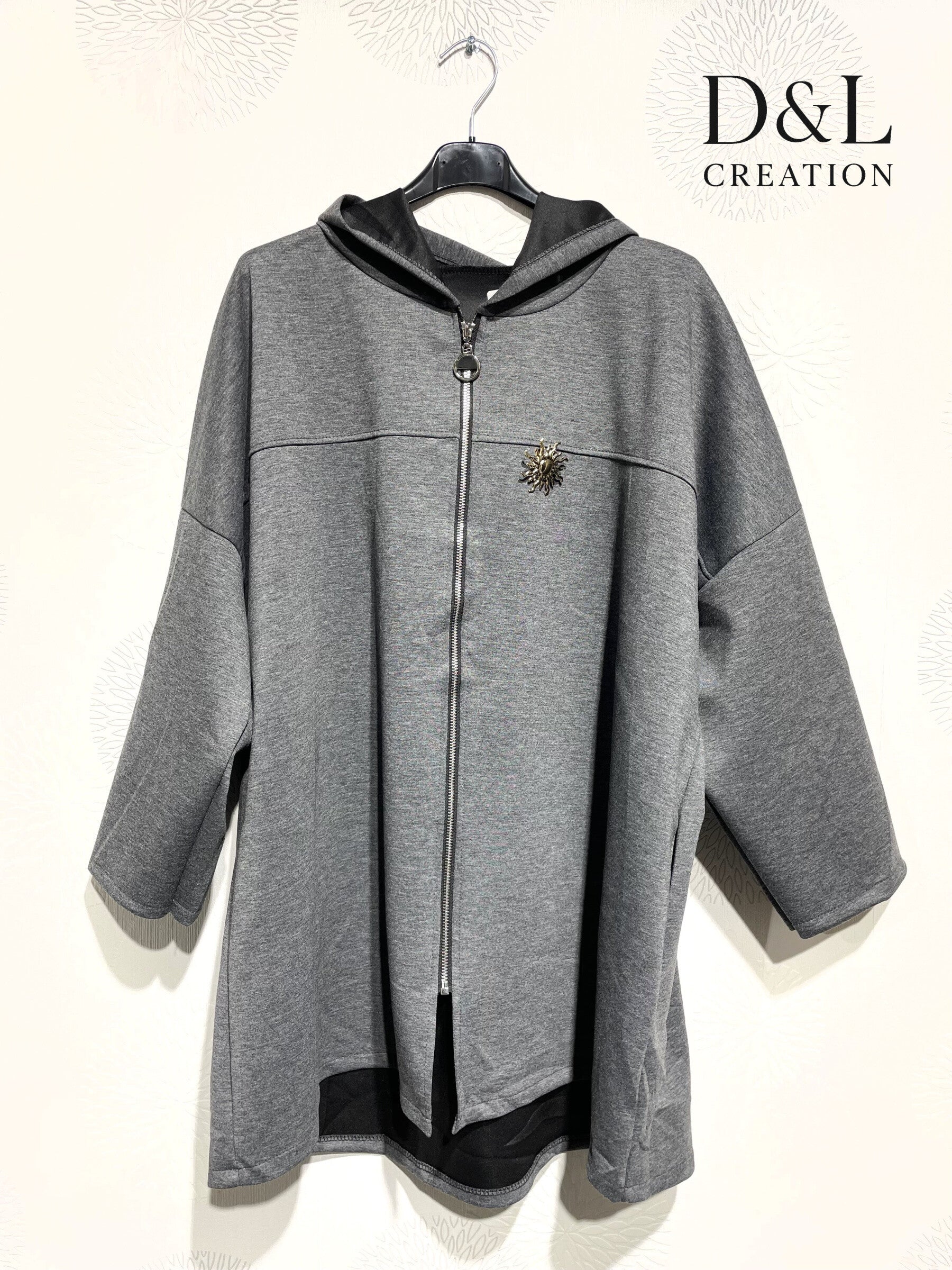 Soft plus-size sportswear cardigan with sun brooch