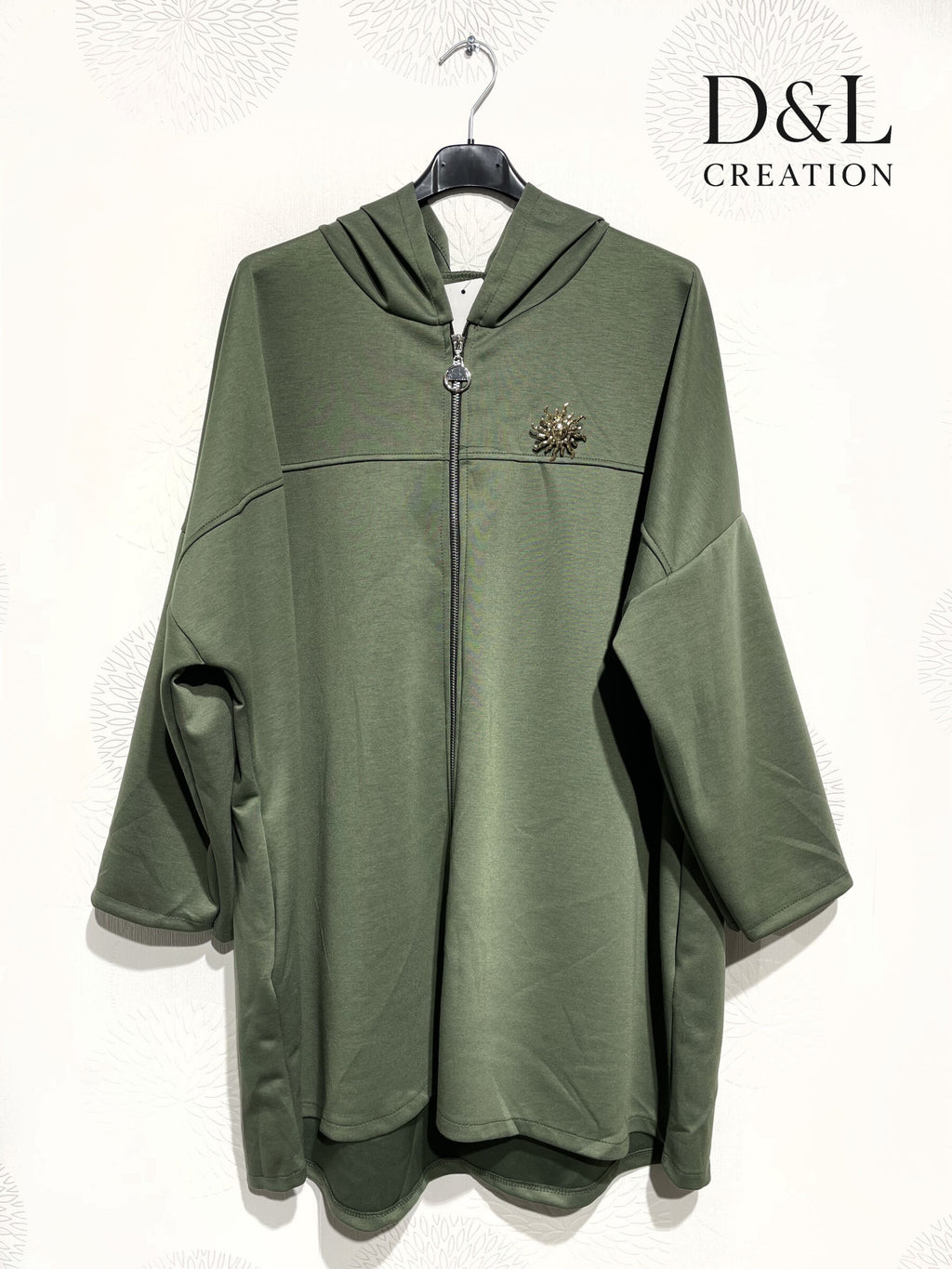 Soft plus-size sportswear cardigan with sun brooch