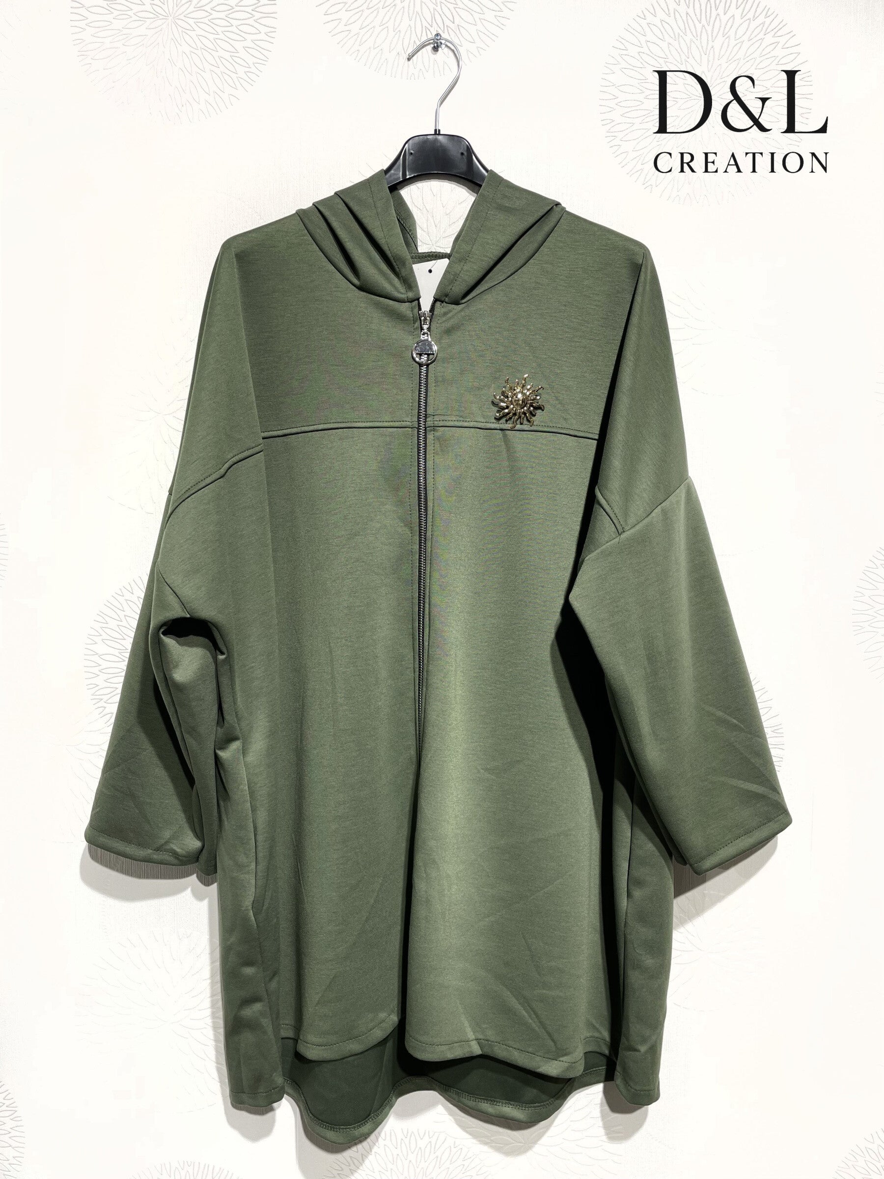 Soft plus-size sportswear cardigan with sun brooch