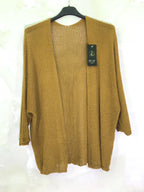 Fine knitted cardigan with half-long sleeves i Stor Storlek