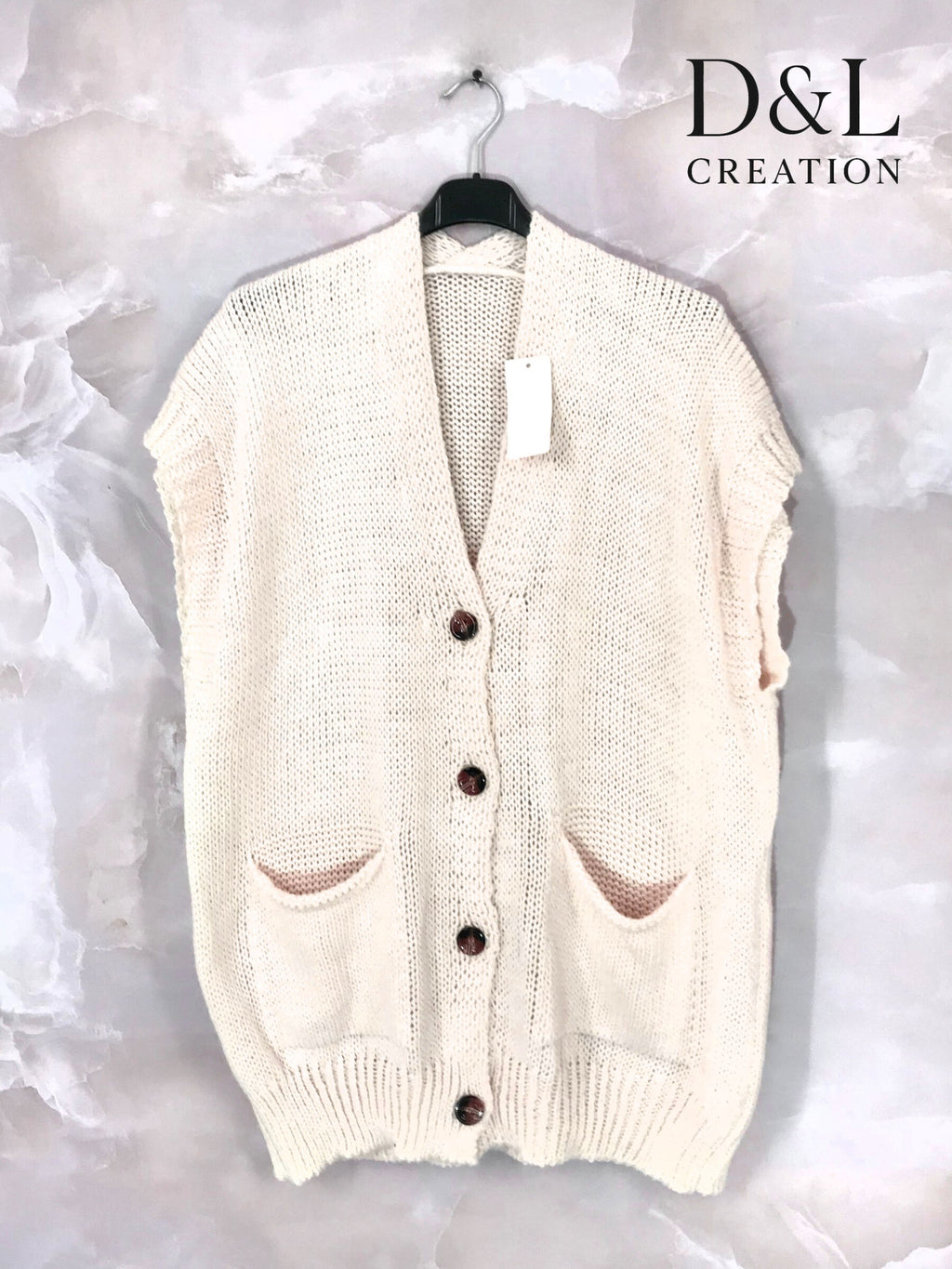 Sleeveless knit vest with pockets sizes 38 to 50 i Stor Storlek