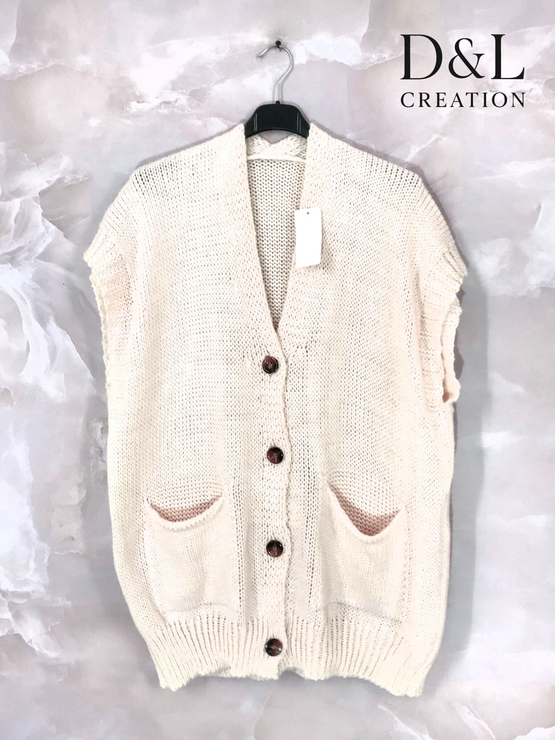 Sleeveless knit vest with pockets sizes 38 to 50 i Stor Storlek