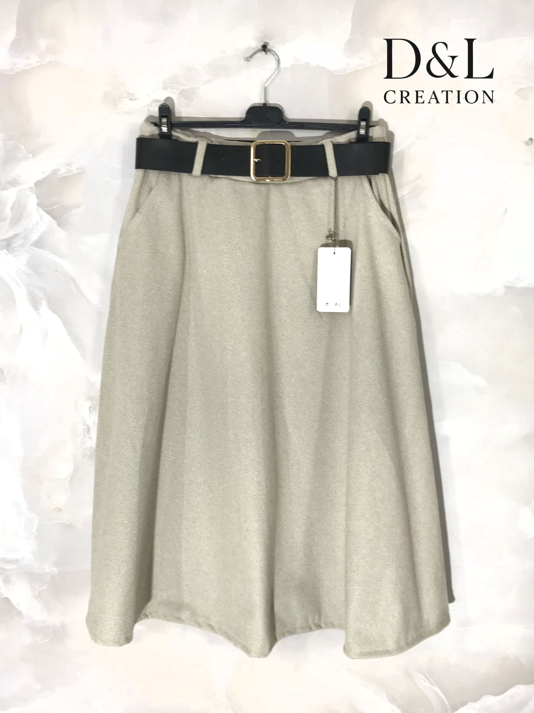 A-line midi skirt with pockets and belt sizes T36 to T44 i Stor Storlek
