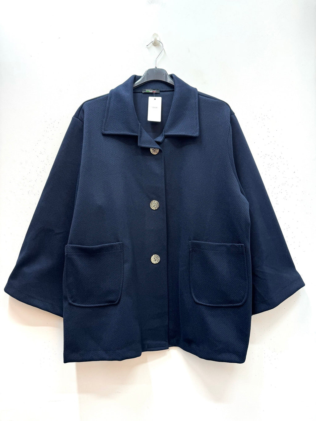 Kappa med klassisk krage i ribbat ull-liknande material i Stor Storlek