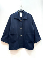 Kappa med klassisk krage i ribbat ull-liknande material i Stor Storlek