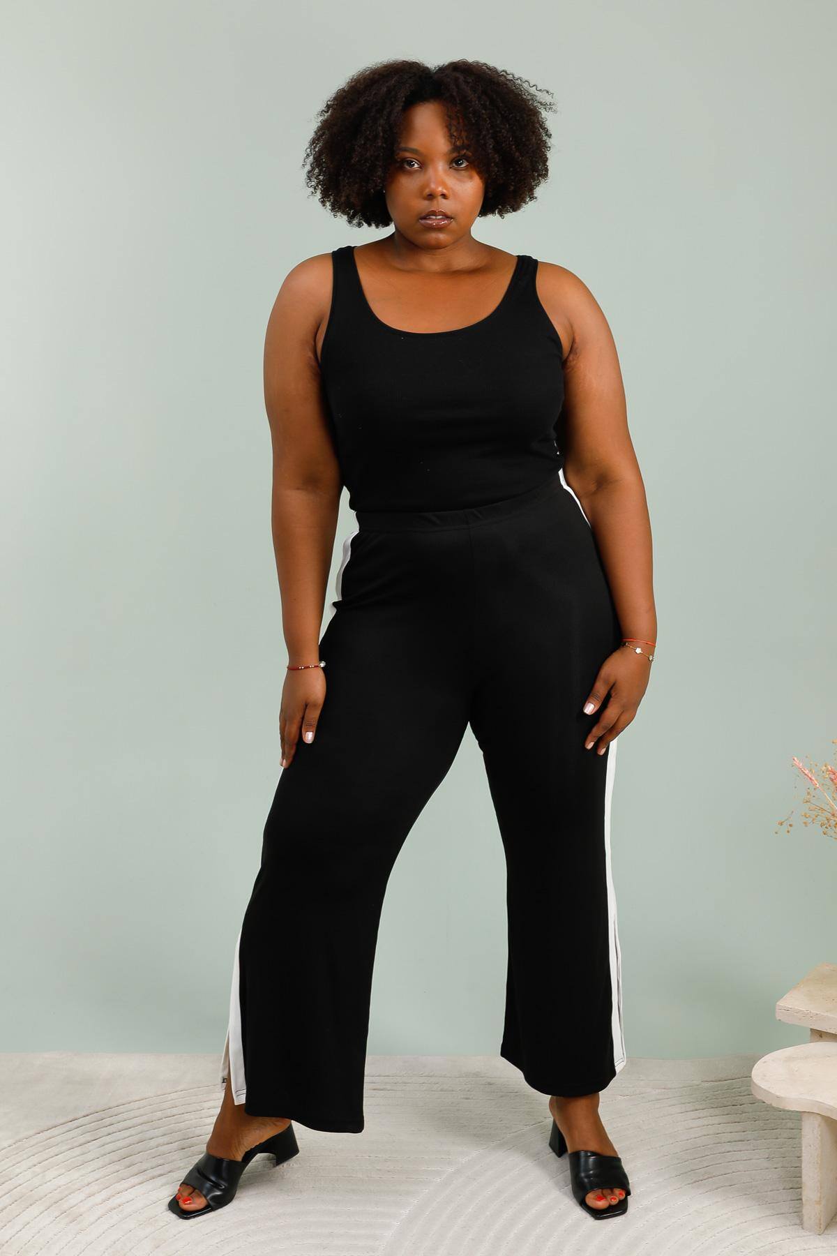 Two -color elastic size pants on the side and split hem i Stor Storlek