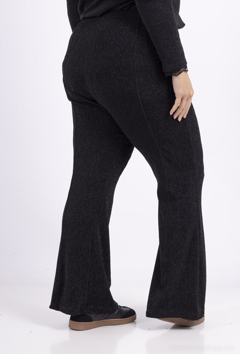 Glittriga utsvängda byxor i stor storlek