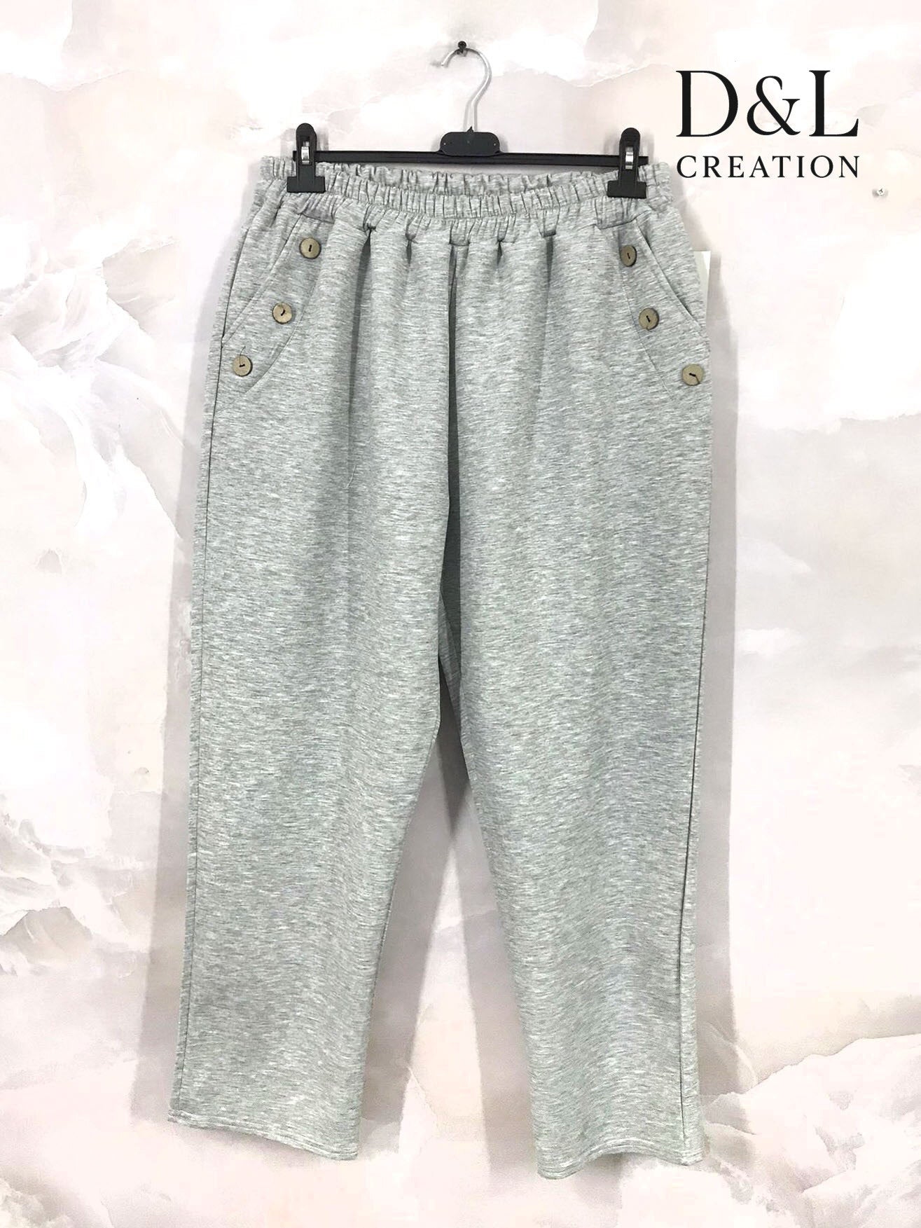 Sportswear fabric trousers with buttons and pockets