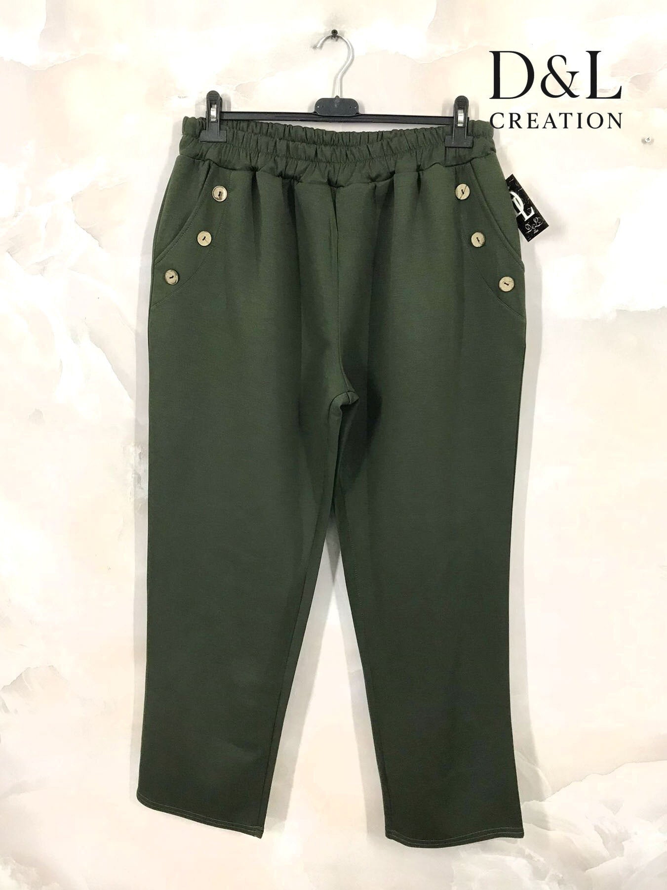 Sportswear fabric trousers with buttons and pockets