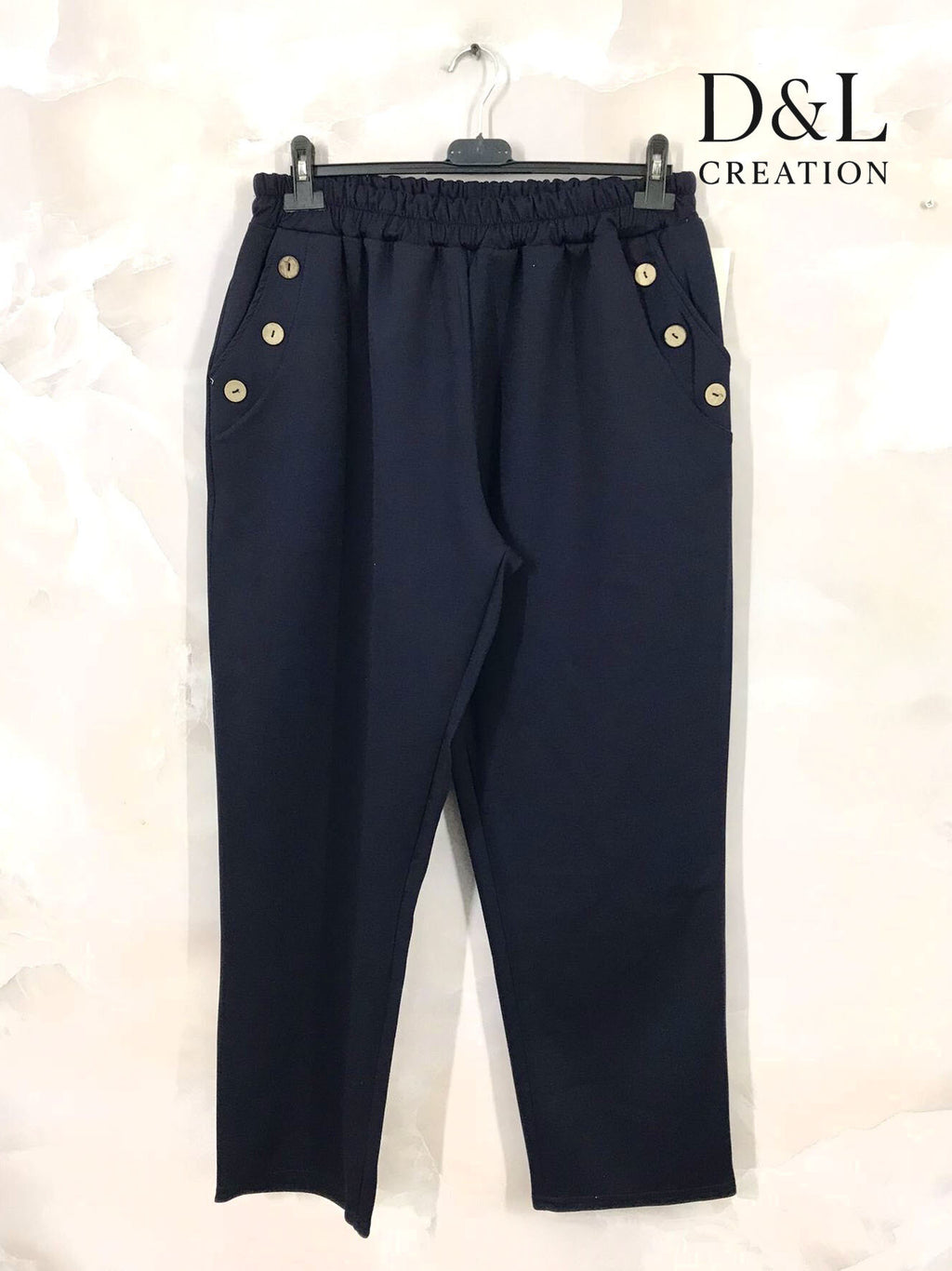 Sportswear fabric trousers with buttons and pockets