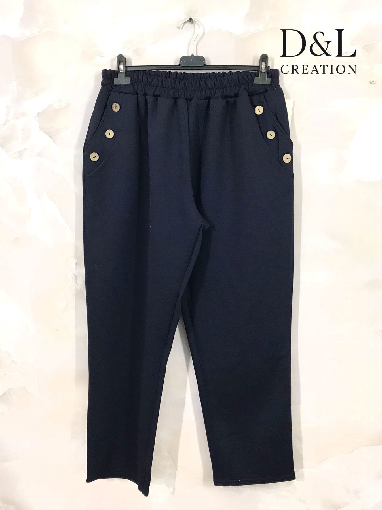 Sportswear fabric trousers with buttons and pockets