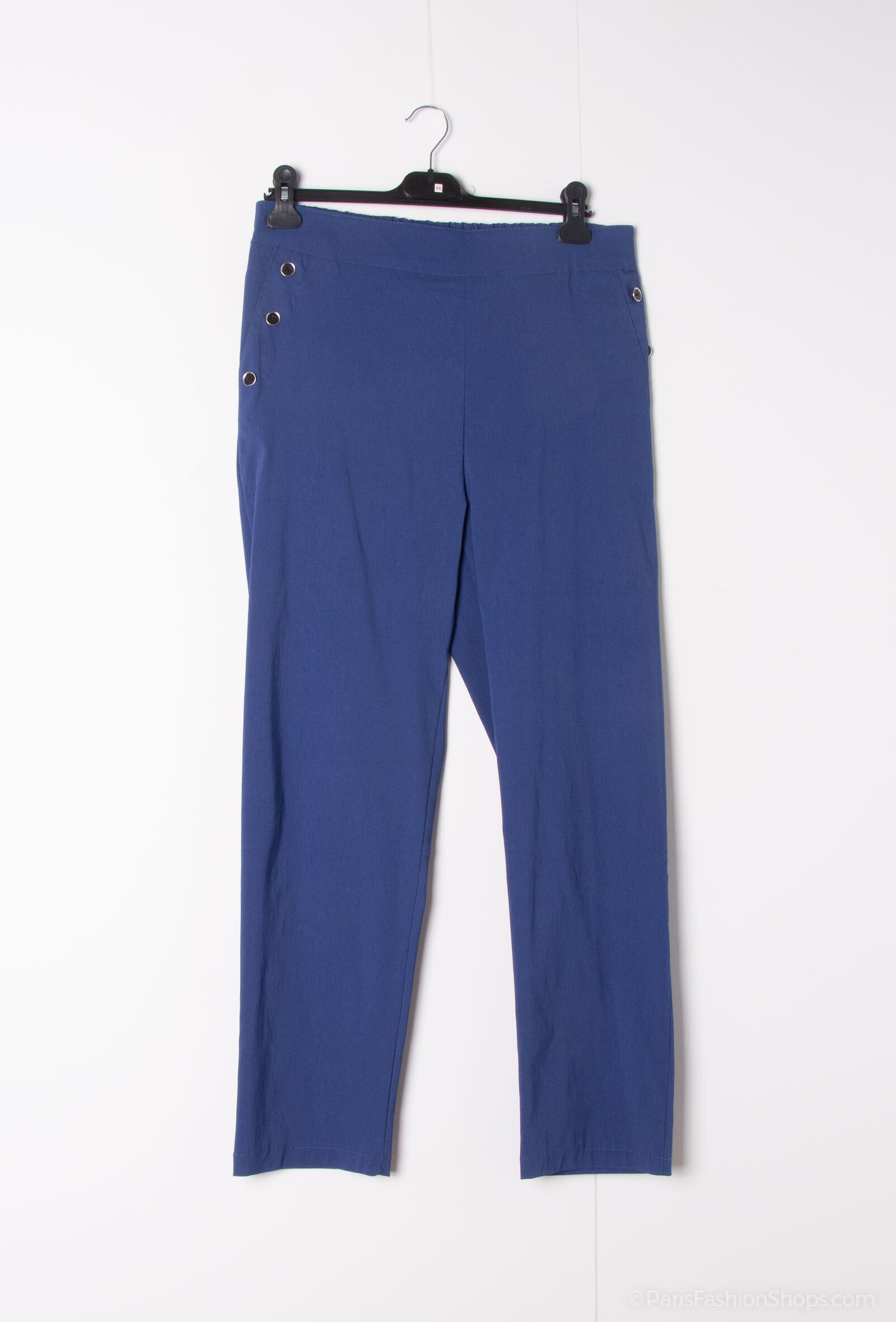 Plus Size Pants there are pockets with 3 button