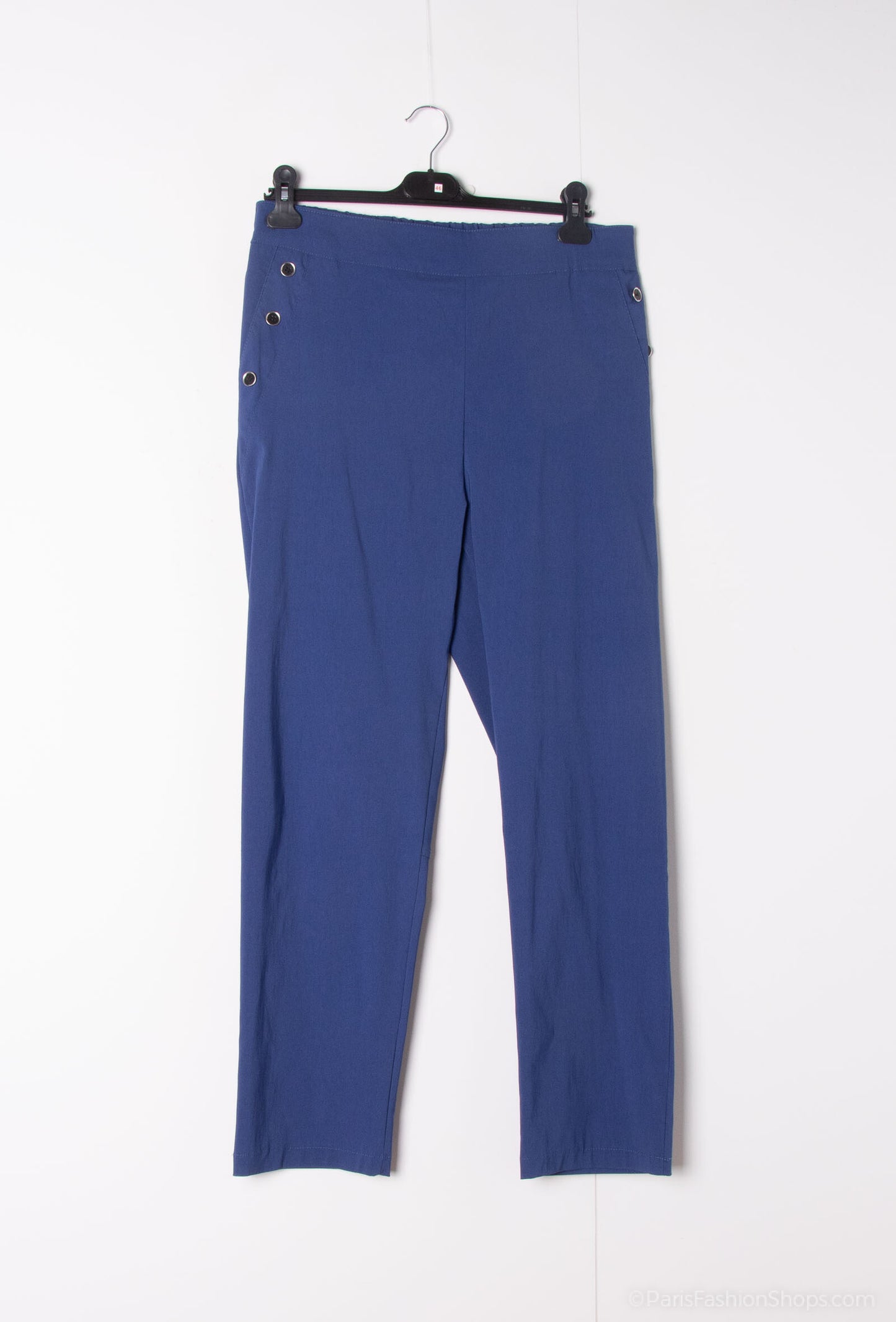 Plus Size Pants there are pockets with 3 button
