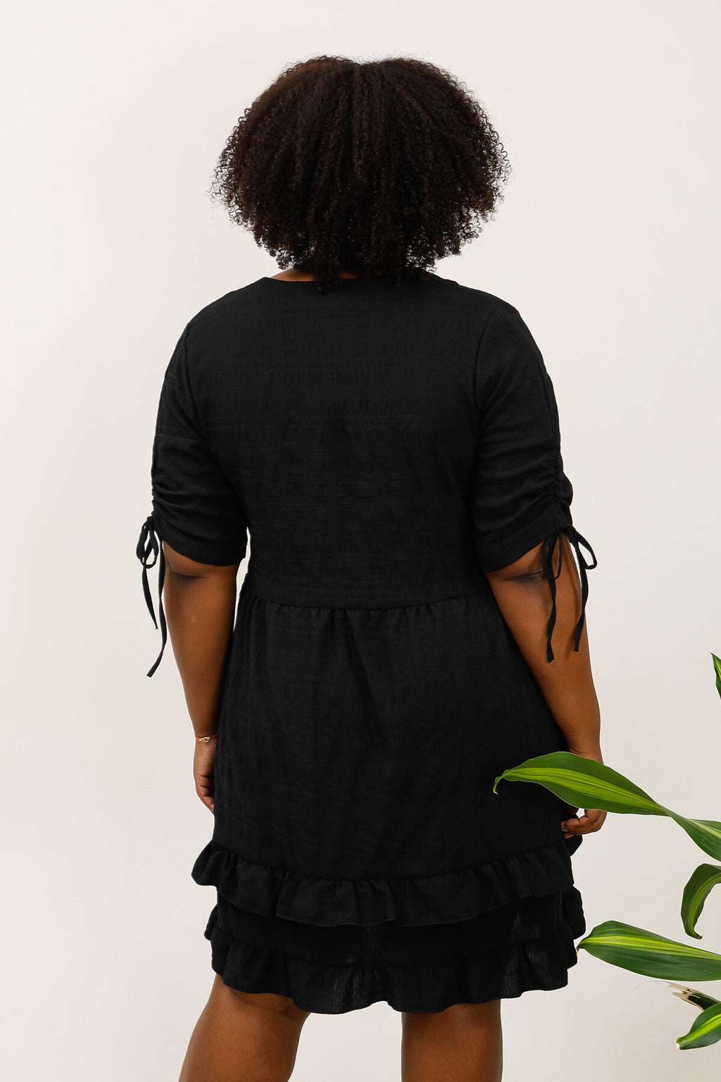 Kjolar i kortärmad bubbeltyg med stor knut i Stor Storlek