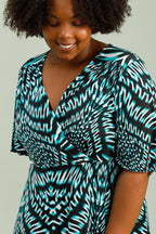 Kortärmad trapeziusklänning i stor storlek