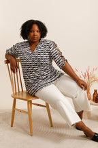 Tops in openwork sleeves with a ripped cross -sizes for women i Stor Storlek