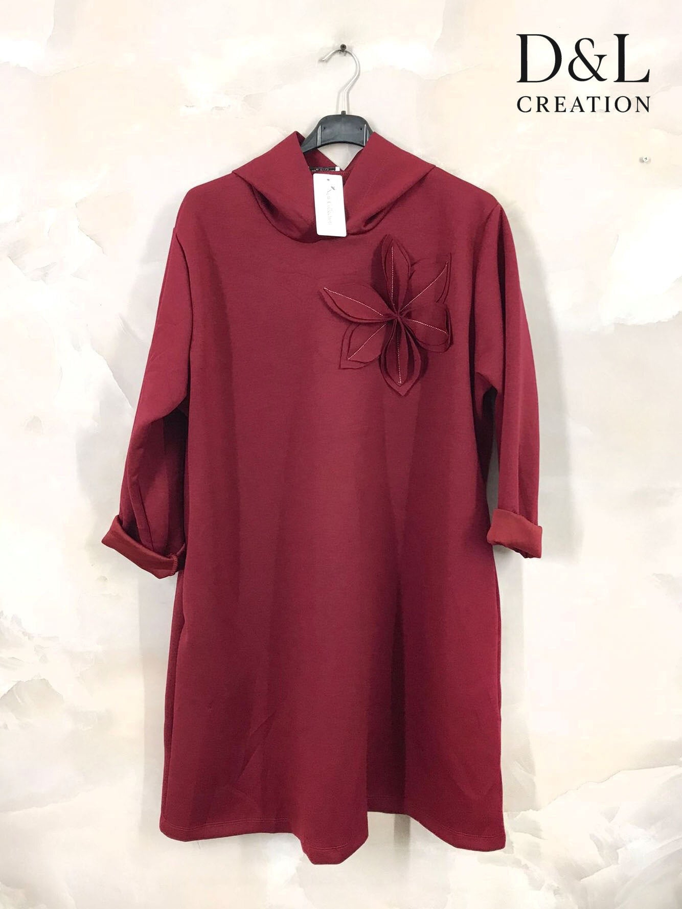 Soft hooded tunic with floral design