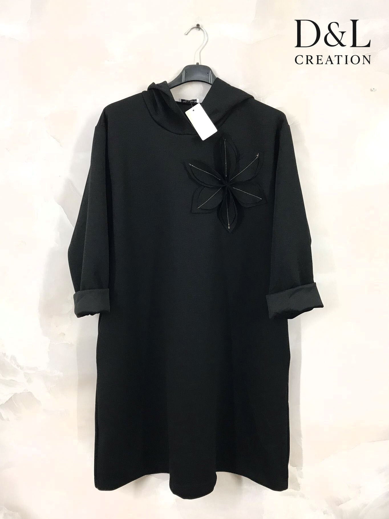Soft hooded tunic with floral design