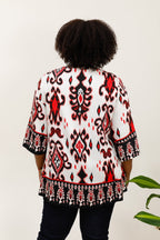 3/4 flared sleeve knot tunic i Stor Storlek