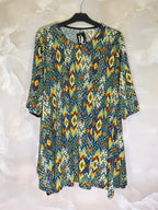Plus Size Flared tunic with half-length sleeves in “swimsuit” material