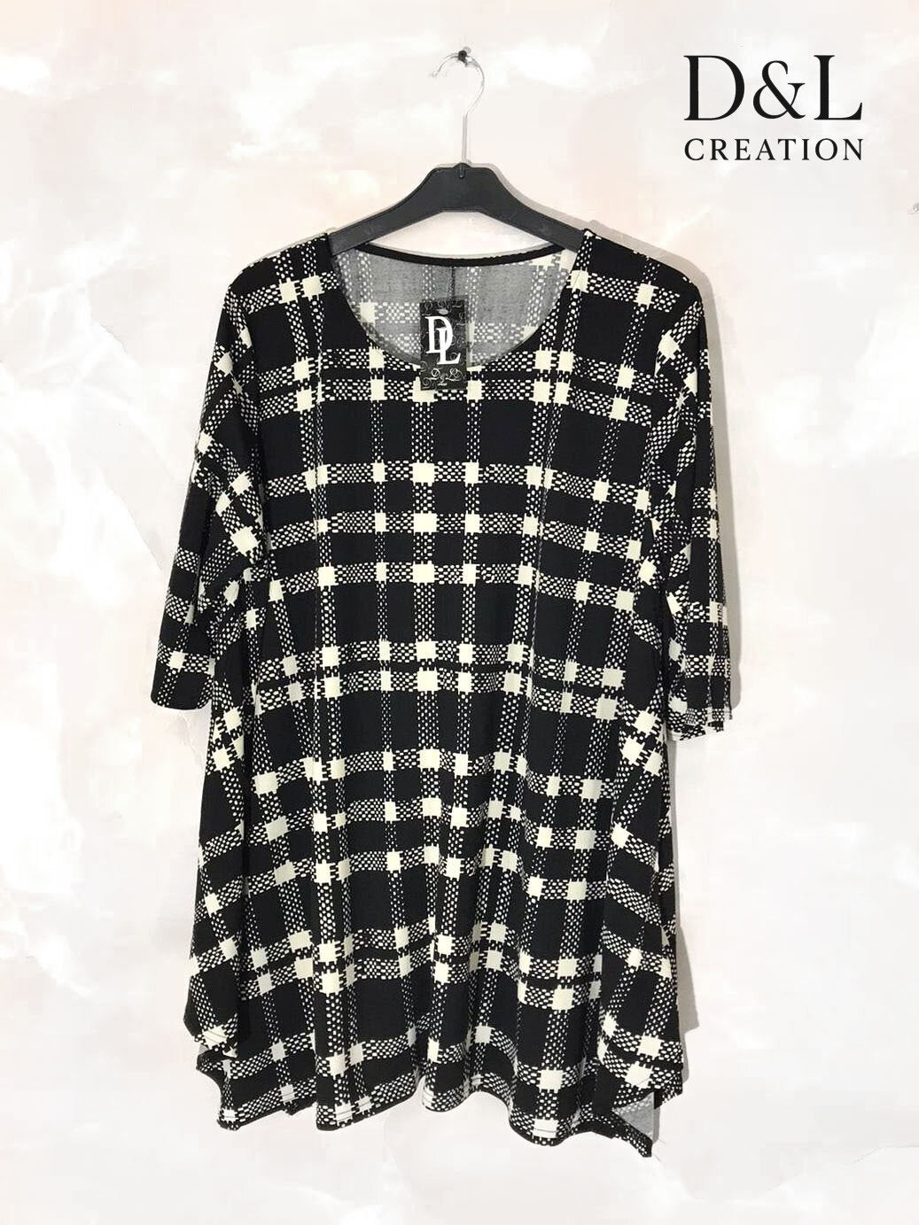 Flared tunic with mid-length sleeves