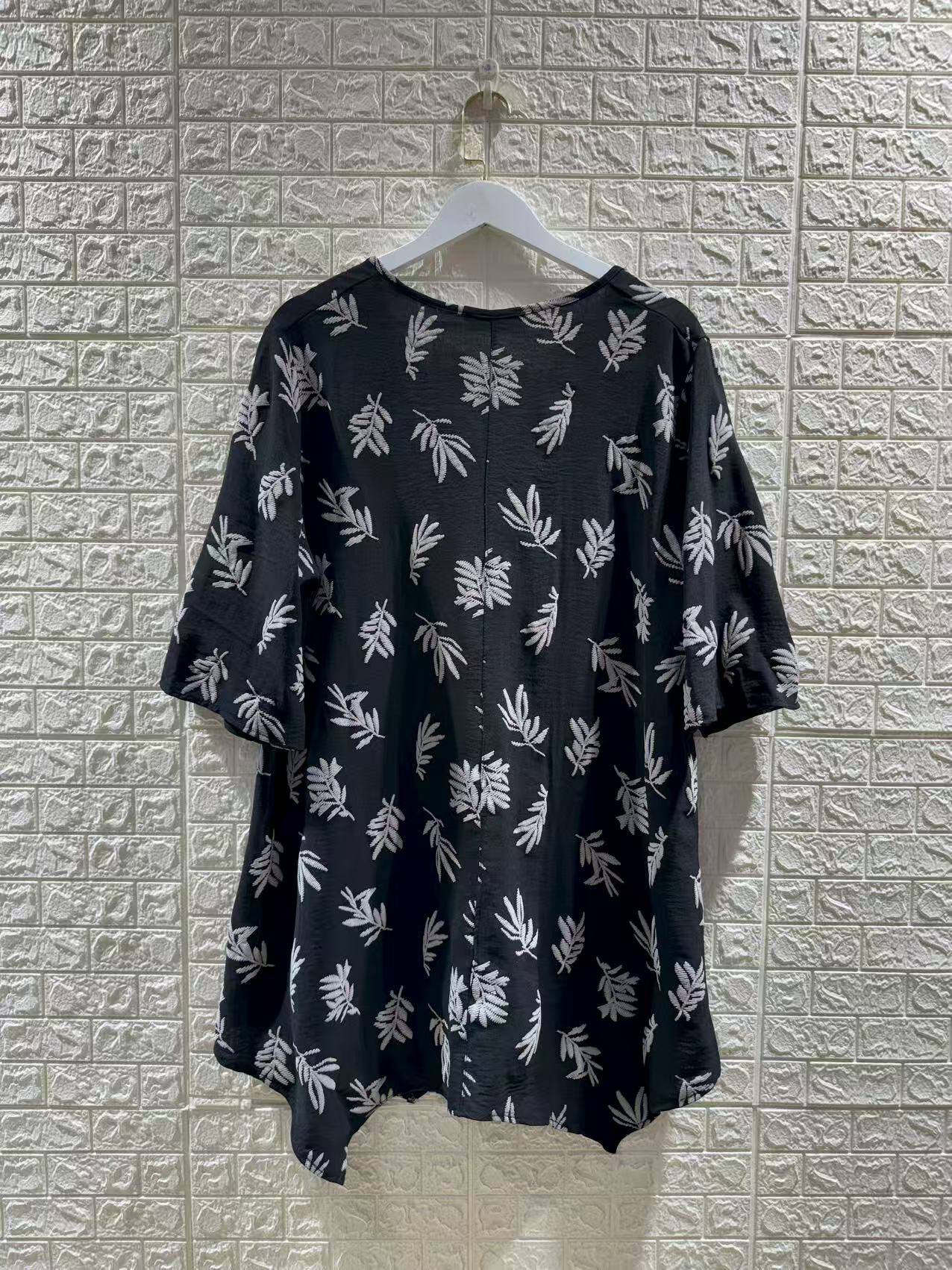 Plus size tunik i stora storlekar