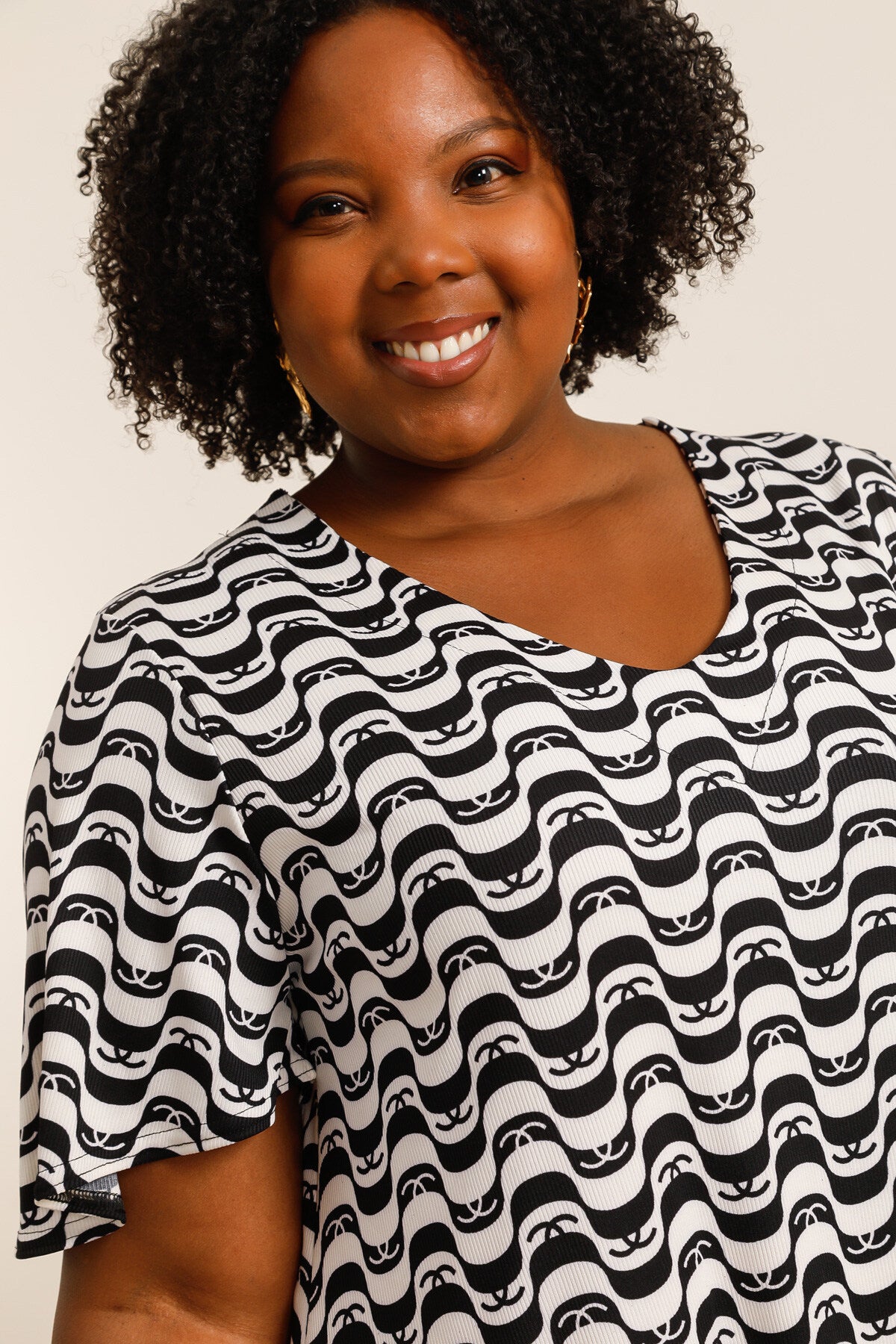 Tunikor med bakknut och utsvängda ärmar i stor storlek