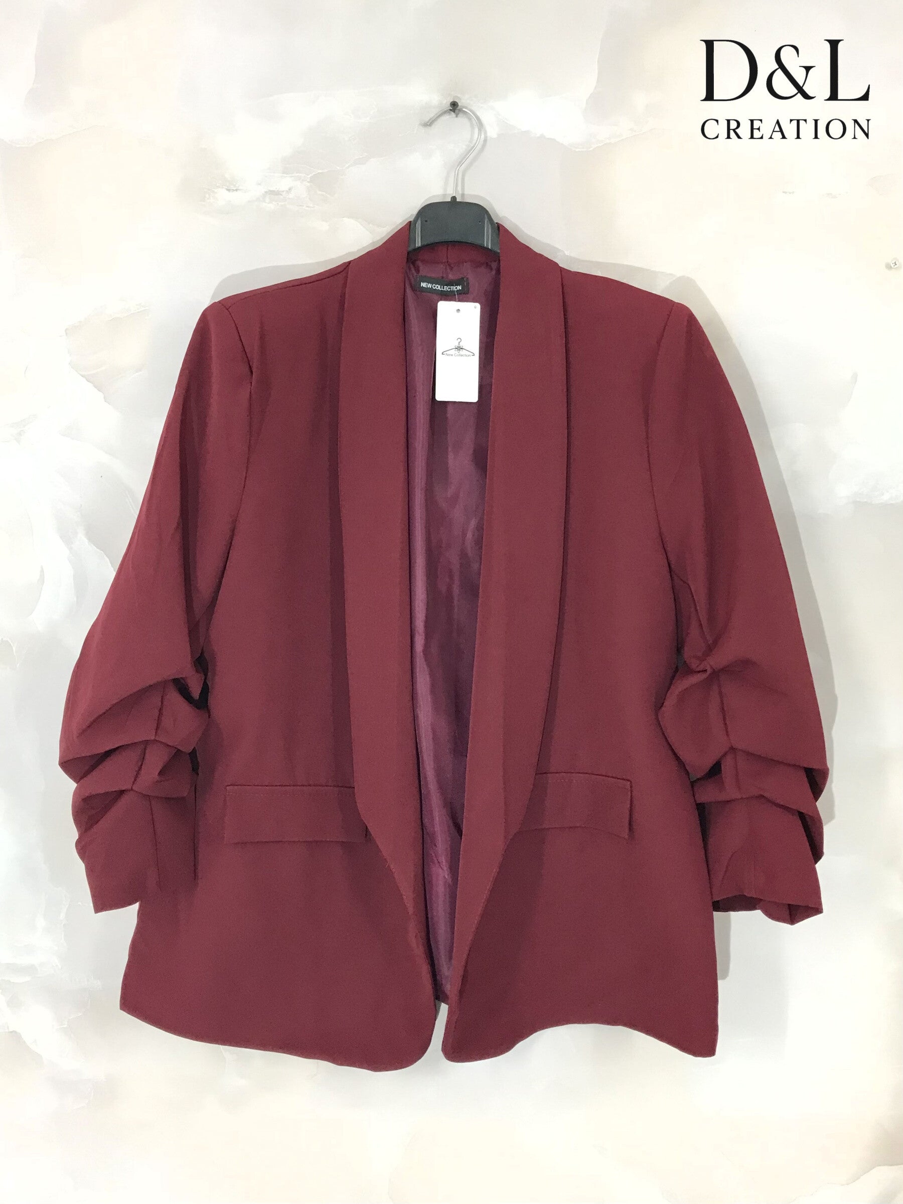 Blazer jacket with rolled-up sleeves and faux pockets