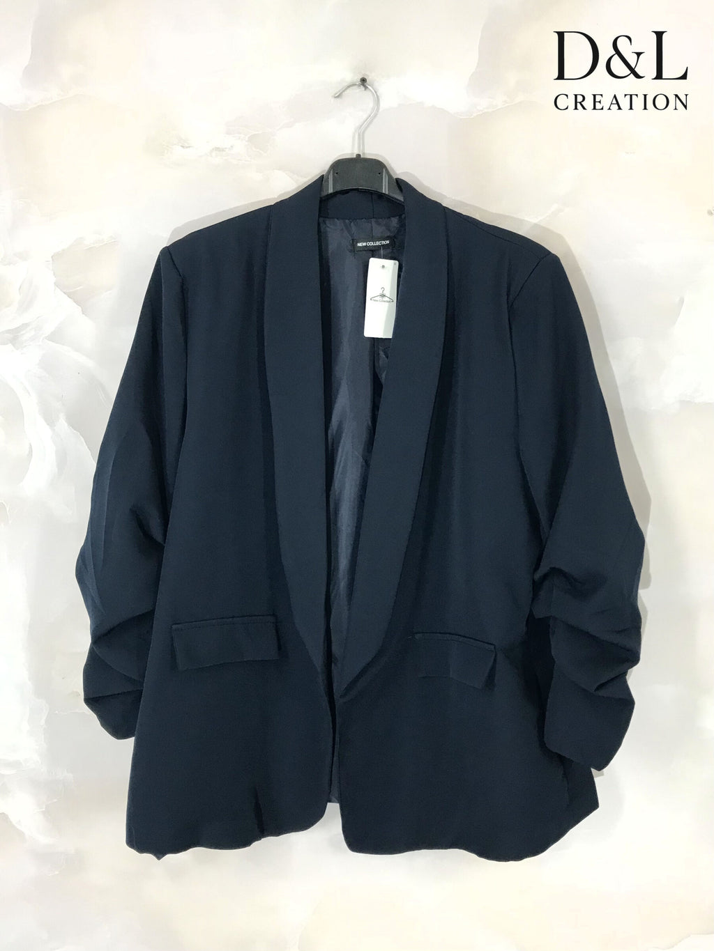 Blazer jacket with rolled-up sleeves and faux pockets