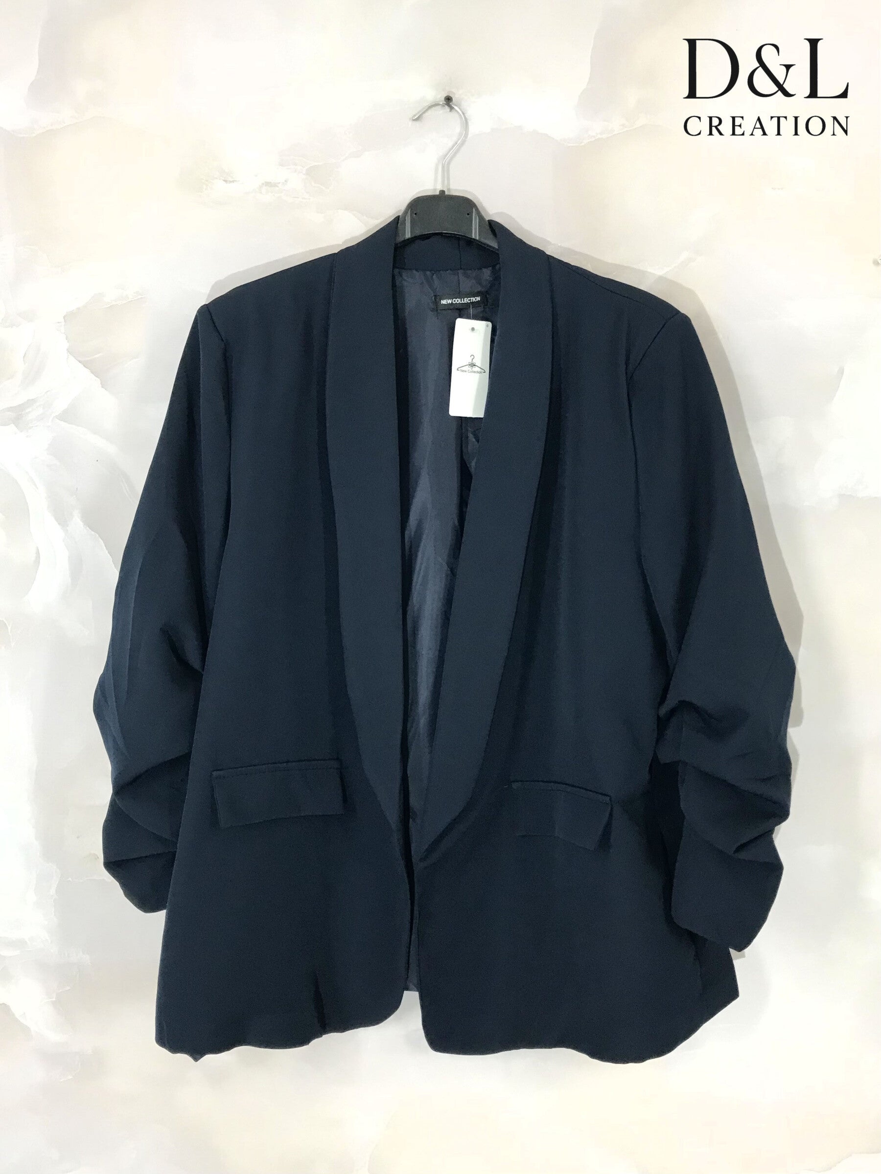 Blazer jacket with rolled-up sleeves and faux pockets